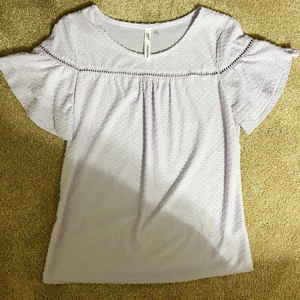 light purple blouse with dot detailing and flow sleeves! size medium!